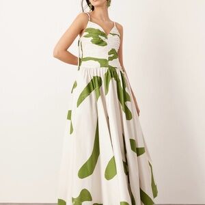 Ruched bodice drop waist midi dress with abstract print